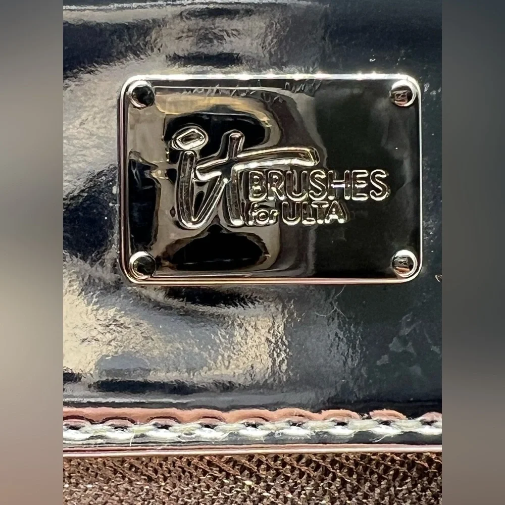 It Cosmetics rose gold and silver makeup bag